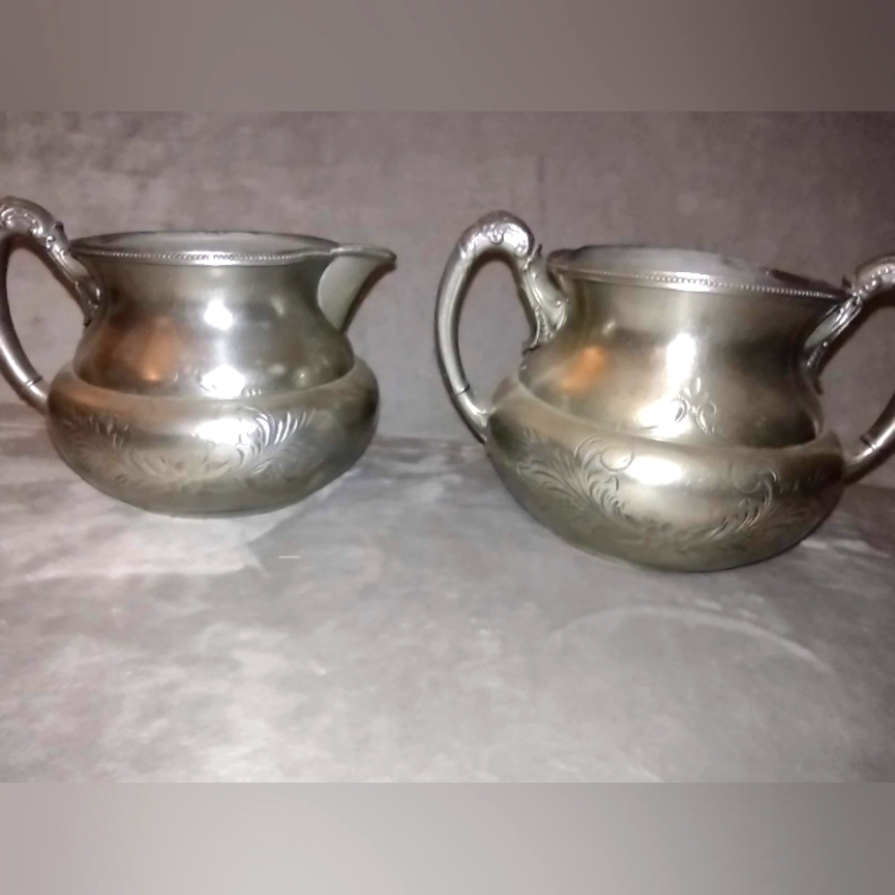 HOMAN SILVER SET,  PITCHER AND URN